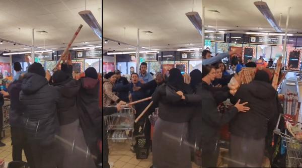 Luptă bizară în fața unui supermarket din Londra: cumpărătorii aruncă cu role de hârtie pentru cadouri unul în altul 