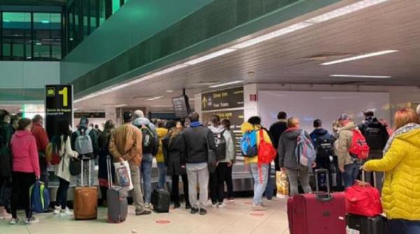 Unu din trei români, care se întorc acasă de Crăciun, vine din Germania şi Italia (studiu)