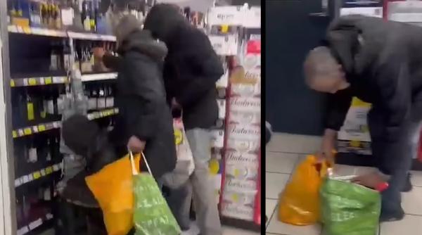 Hoți surprinși cum fură în văzul tuturor sticle de băutură din supermarket, în timp ce clienții se îmbulzesc pentru ultimele cumpărături / VIDEO