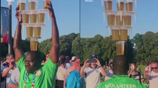 Un voluntar EURO 2024 a făcut senzație cărând 9 beri pe cap. VIDEO