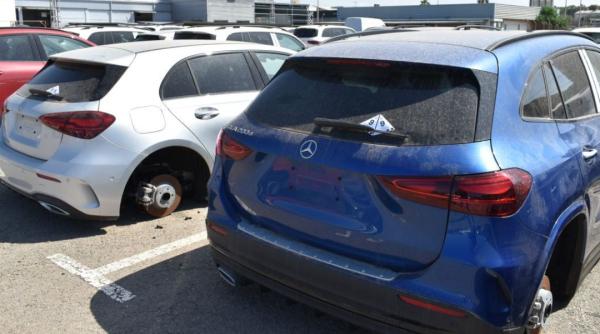 Trei români din Spania au furat roțile de la sute de vehicule de lux. Pradă de 2 milioane de euro