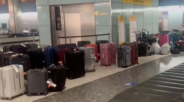 Haos pe aeroportul Heathrow din Marea Britanie: Munți de bagaje și nervi întinși din cauza anulărilor masive de zboruri