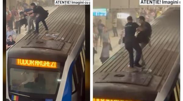 Un individ s-a urcat pe o garnitură de metrou la Piața Victoriei. Un polițist s-a dus după el 