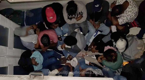 Procurorii DIICOT, percheziții la traficanții de migranţi. Fiecare persoană plătea 1.300 de euro pentru a ajunge în Italia