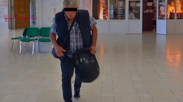 El e bărbatul care a intrat în Parlamentul României și a dat foc