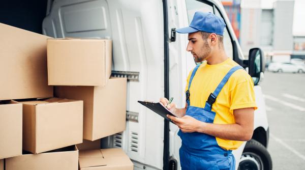 Criză la poșta germană. Deutsche Post- DHL taie 8.000 de locuri de muncă