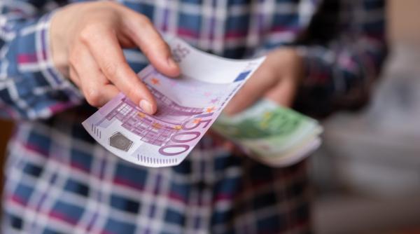 Românii din Germania vor plăti mai puțin la electricitate și gaz. Planul lui Merz pentru a scădea facturile la energie