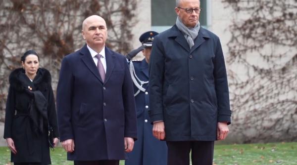 Premierul Bolojan, primit cu onoruri militare la Berlin de cancelarul Friedrich Merz