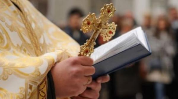 Ziua pe șantier, duminica la altar: Ce face un preot român pentru a se întreține în Anglia