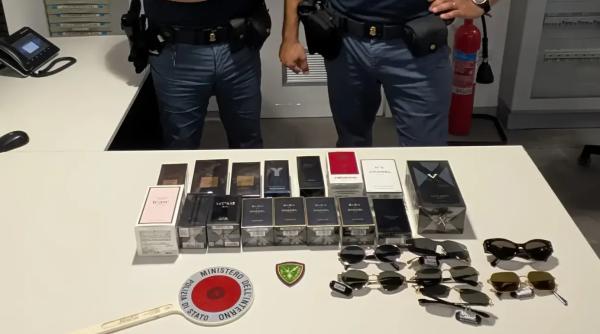 Român prins pe Aeroportul din Bologna cu parfumuri și ochelari furate în valoare de peste 5.000 de euro